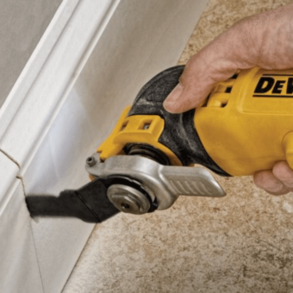 using a oscillating multi tools to trim baseboard
